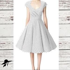 Gown Town white black dot retro fit and flare cross front cap sleeve dress